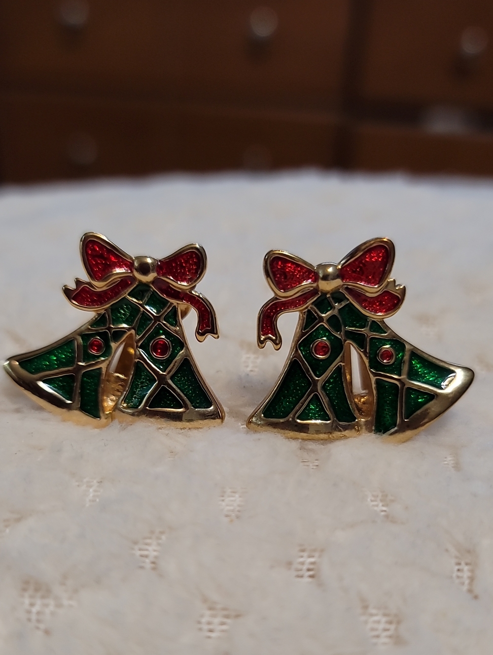 vintage-style green enamel Christmas bell earrings featuring red bows Clip On